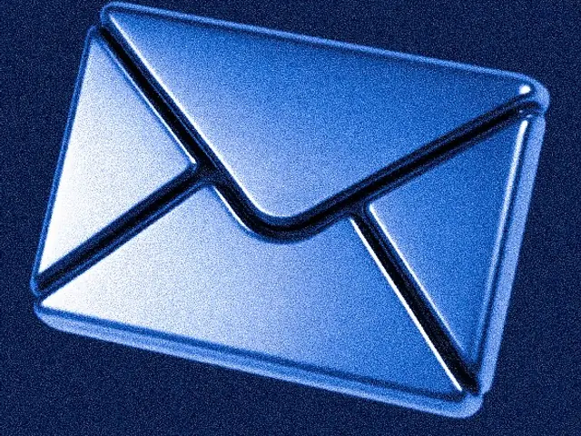 A glossy blue envelope on a dark background
